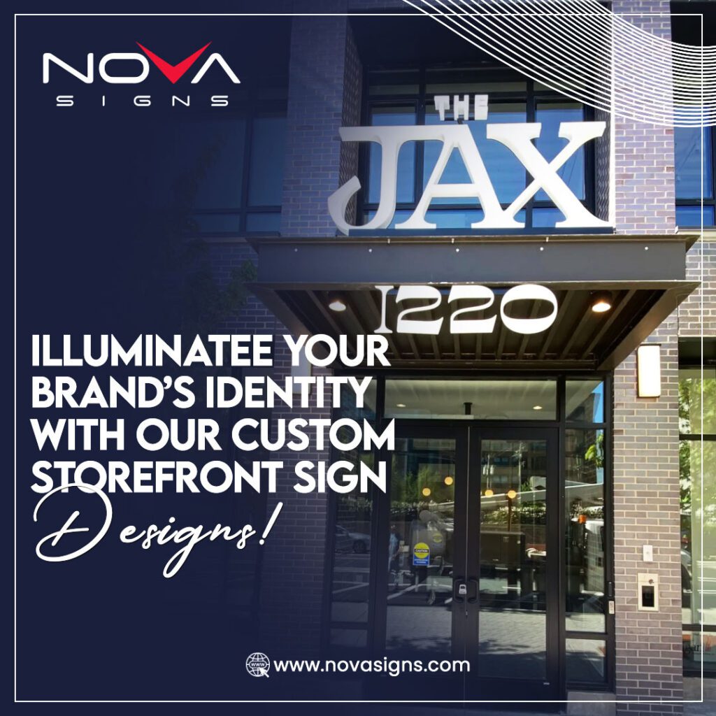 A storefront sign for The Jax building, showcasing the illuminated custom sign design being prominently displayed above the entrance.